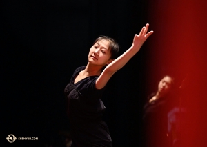 Olivia Chang, another dancer with Shen Yun International Company, warms up before one of two performances in Liverpool.