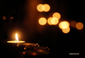 One of many candles burning inside Canterbury Cathedral. (Photo by violinist Steve Song)